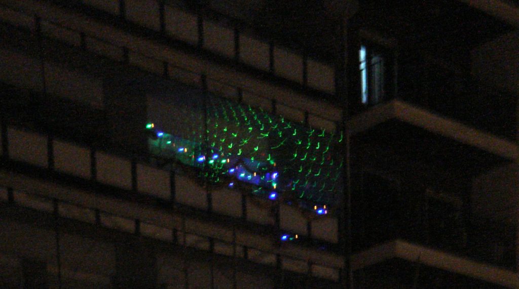 Laser en balcón de Torres Villarroel